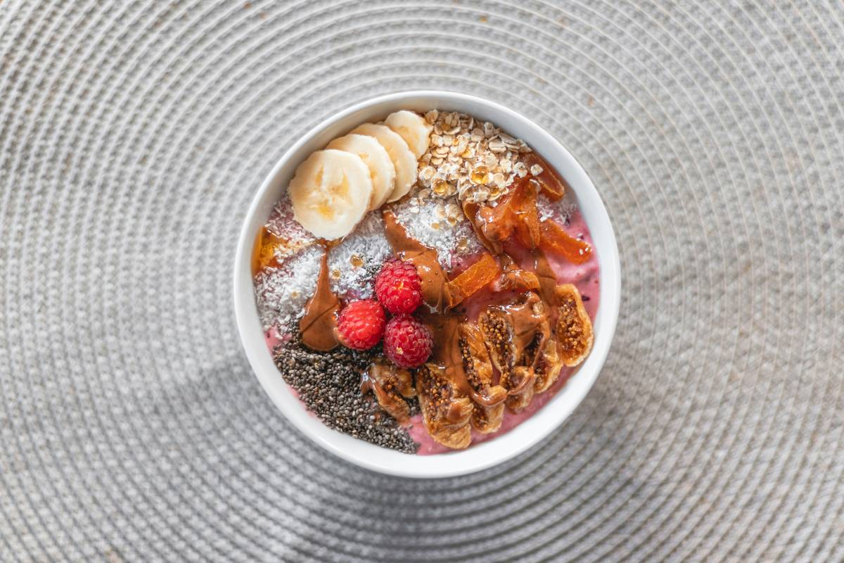amazing individual desserts healthy: chia seed pudding in glass jars with berries and mint garnish